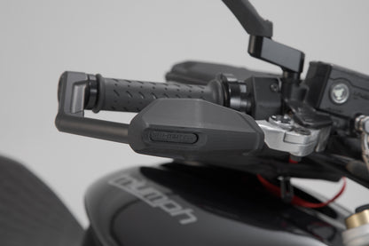 Lever guards with wind protection